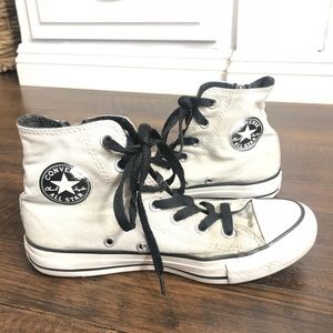 Grey and black high top converse